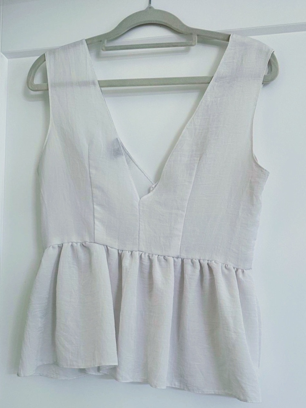 ASOS White peplum top with ruching and a V-neck